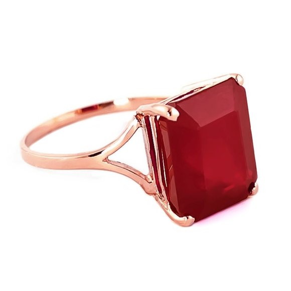 14K. SOLID GOLD RING WITH NATURAL OCTAGON RUBY